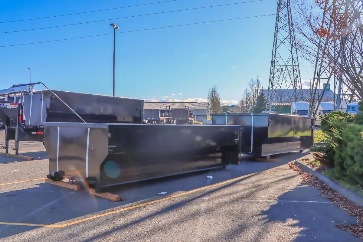 Roll-off dumpster ready for waste disposal at job site for Concrete Dumpster Rental in San Antonio